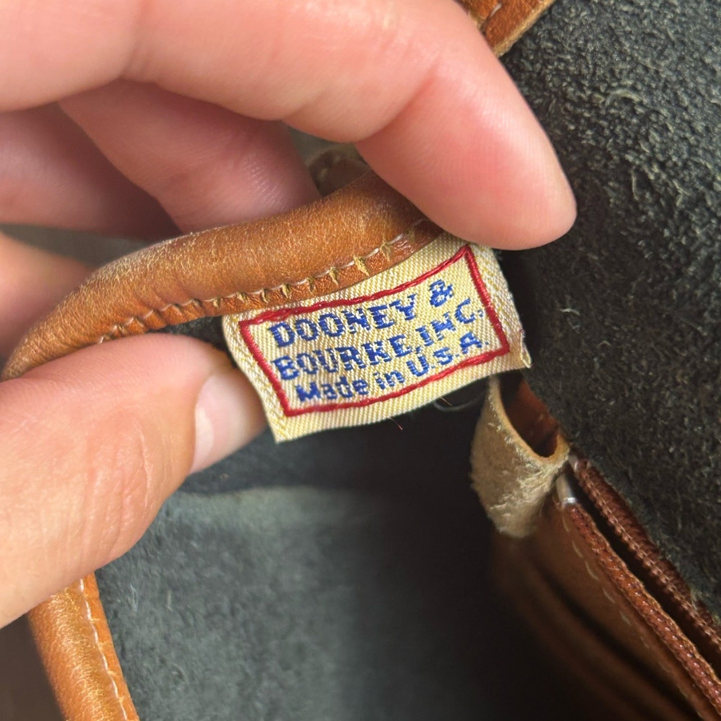 Vintage Dooney and Bourke Elegant Black and Tan pebbled Leather Shoulder Bag