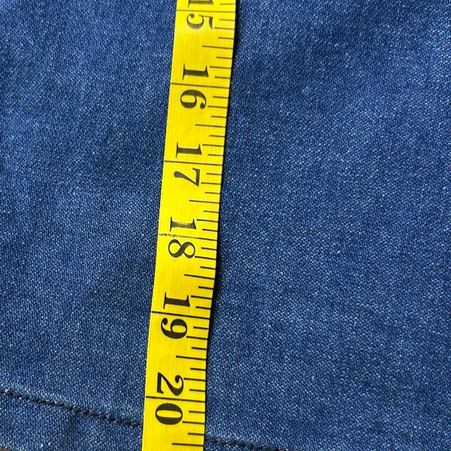 Gitano size 25x21 dark wash knee length skirt with topstitching and slit in back