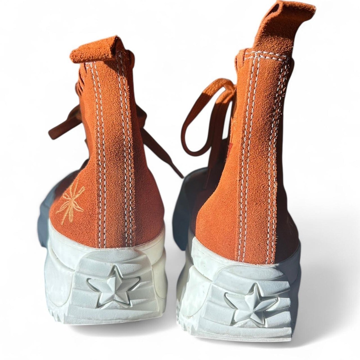 Orange and white converse run star