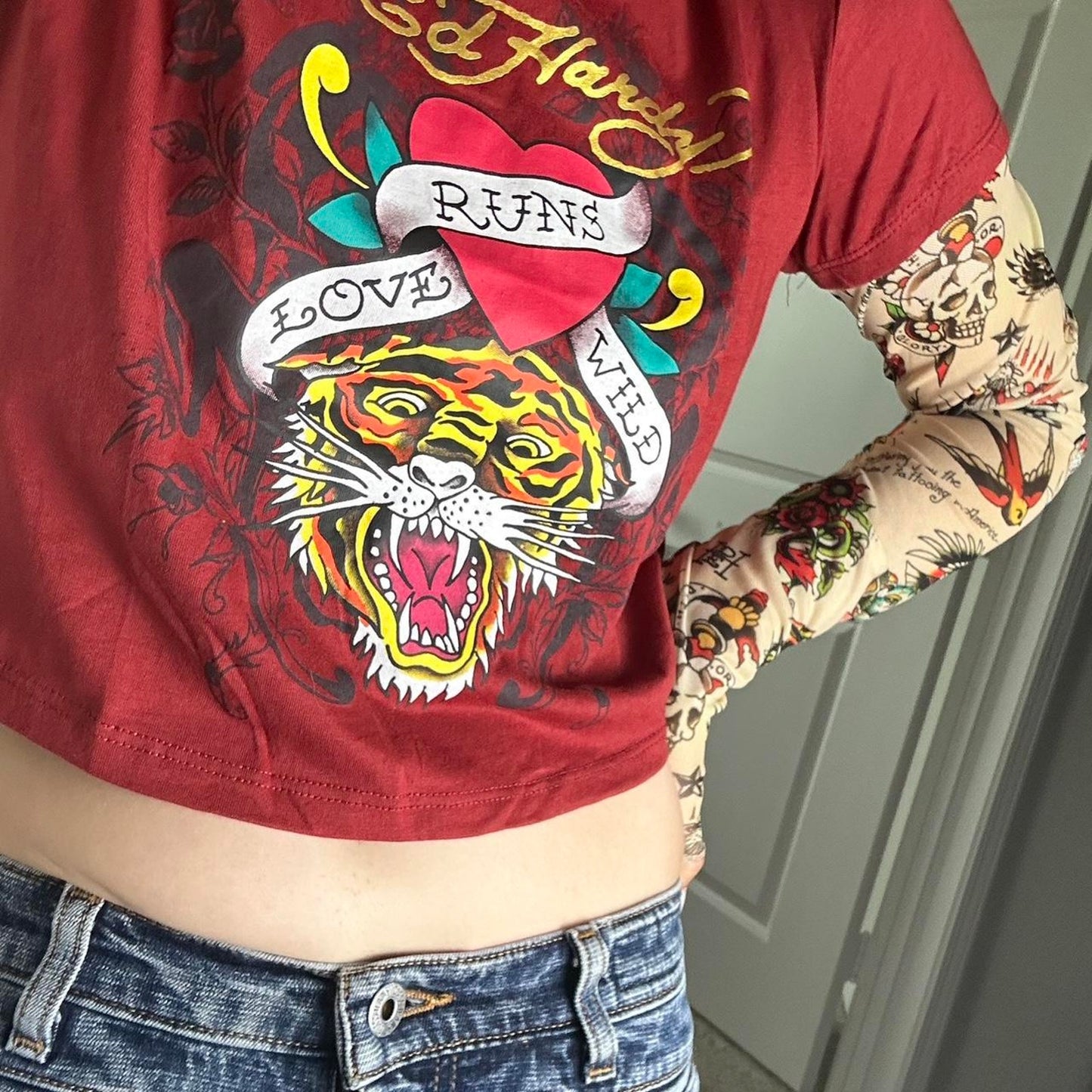 Ed hardy red graphic tattoo
