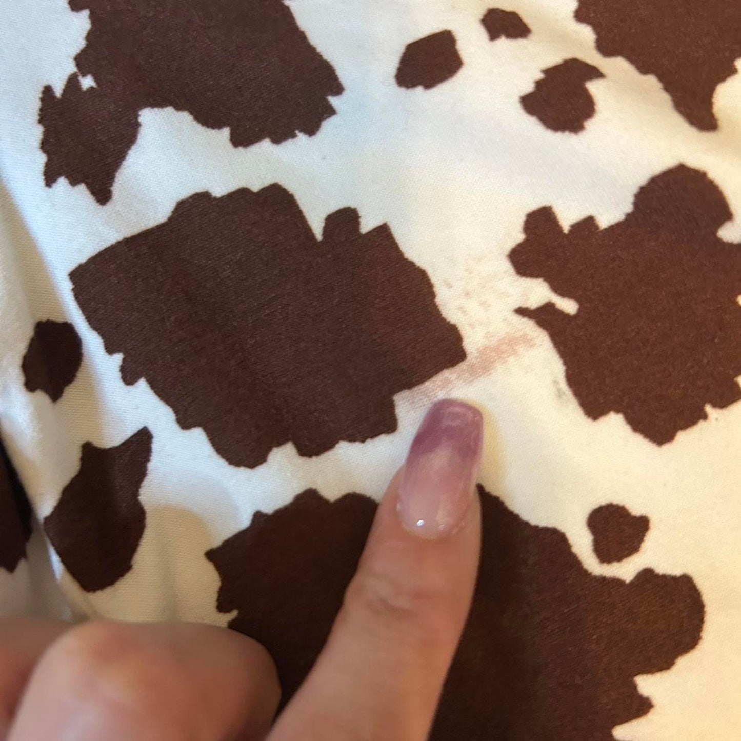 Brown and white cow print
