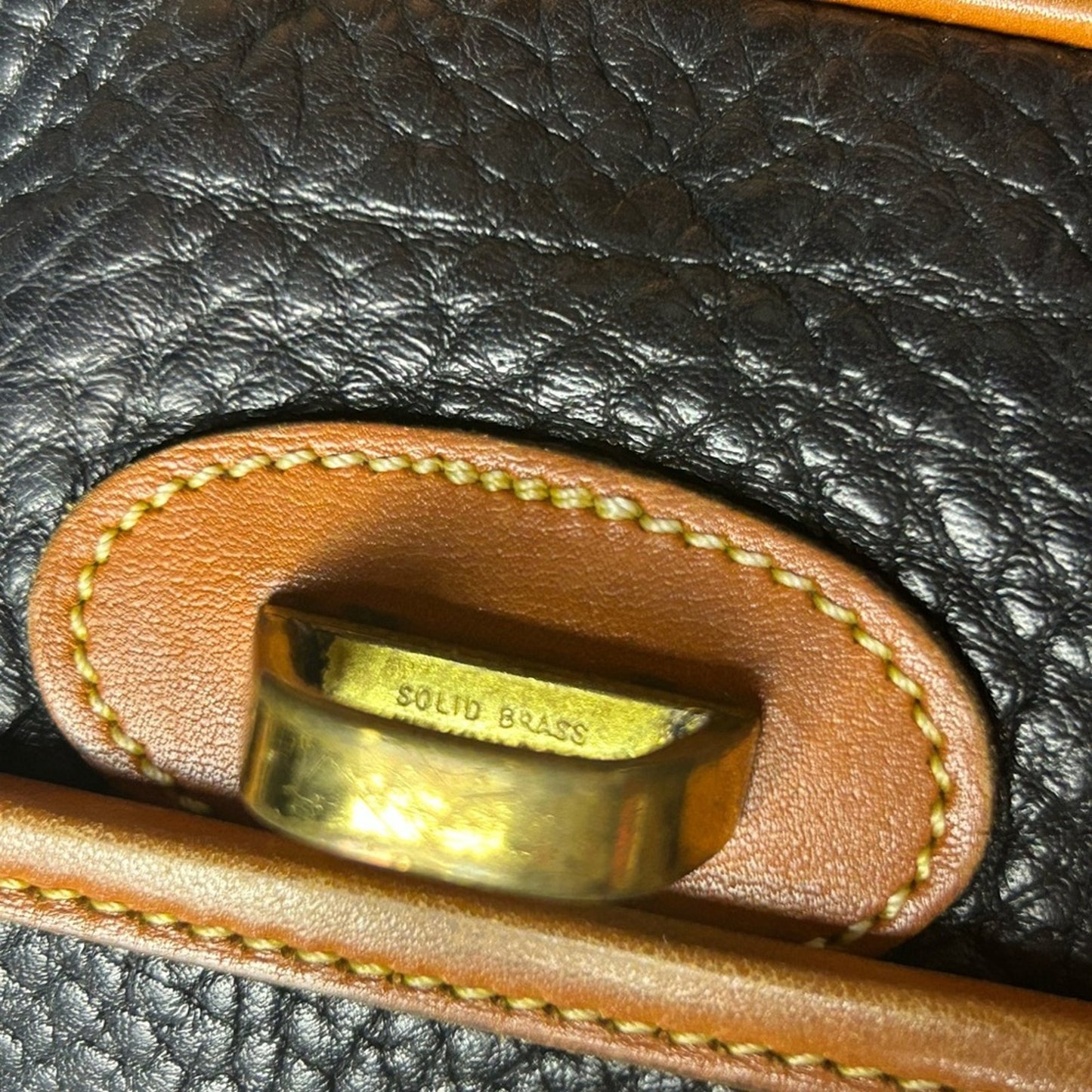 Vintage Dooney and Bourke Elegant Black and Tan pebbled Leather Shoulder Bag