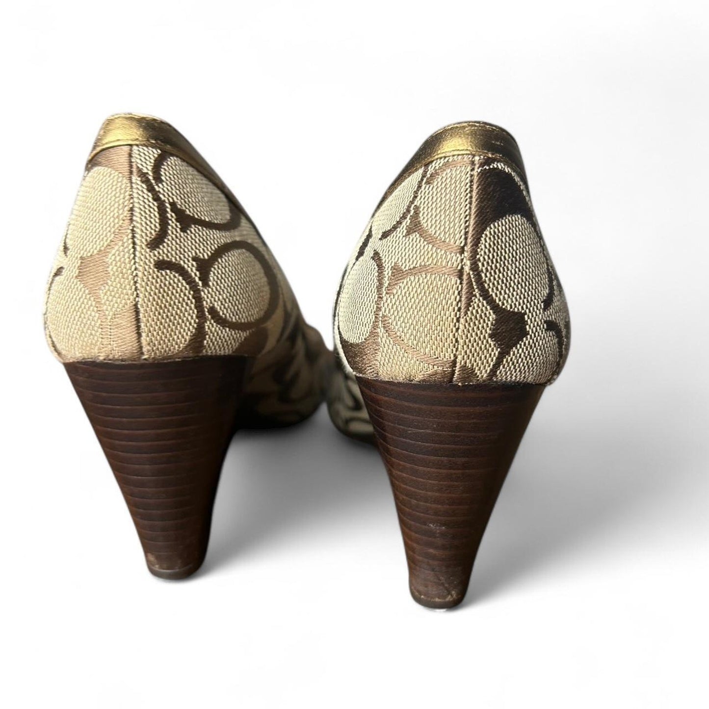 Gold coach monogram wedge heels