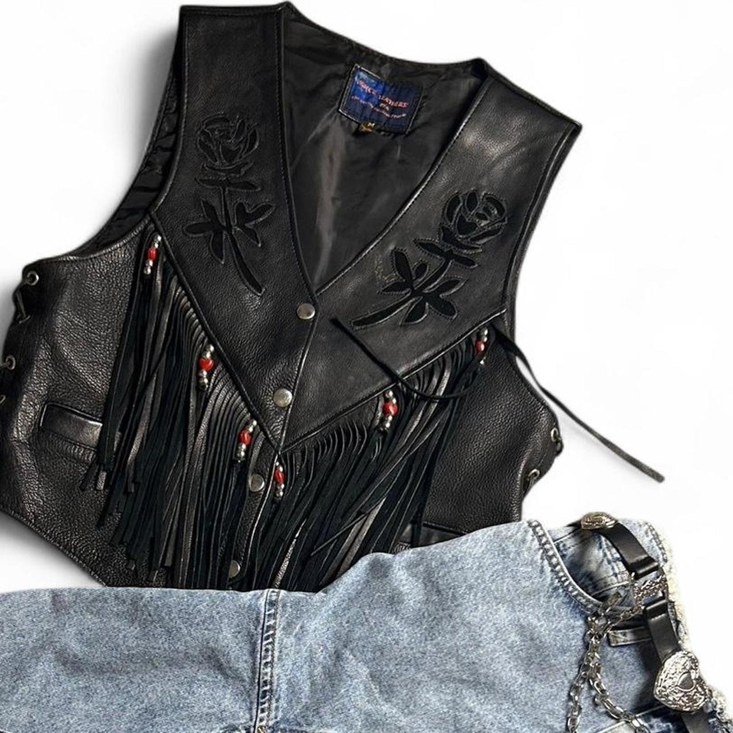 Black leather vest with roses