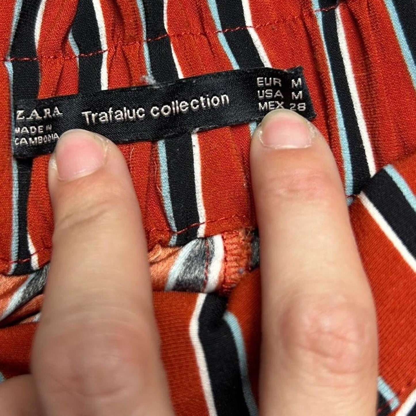 Red and black striped trouser