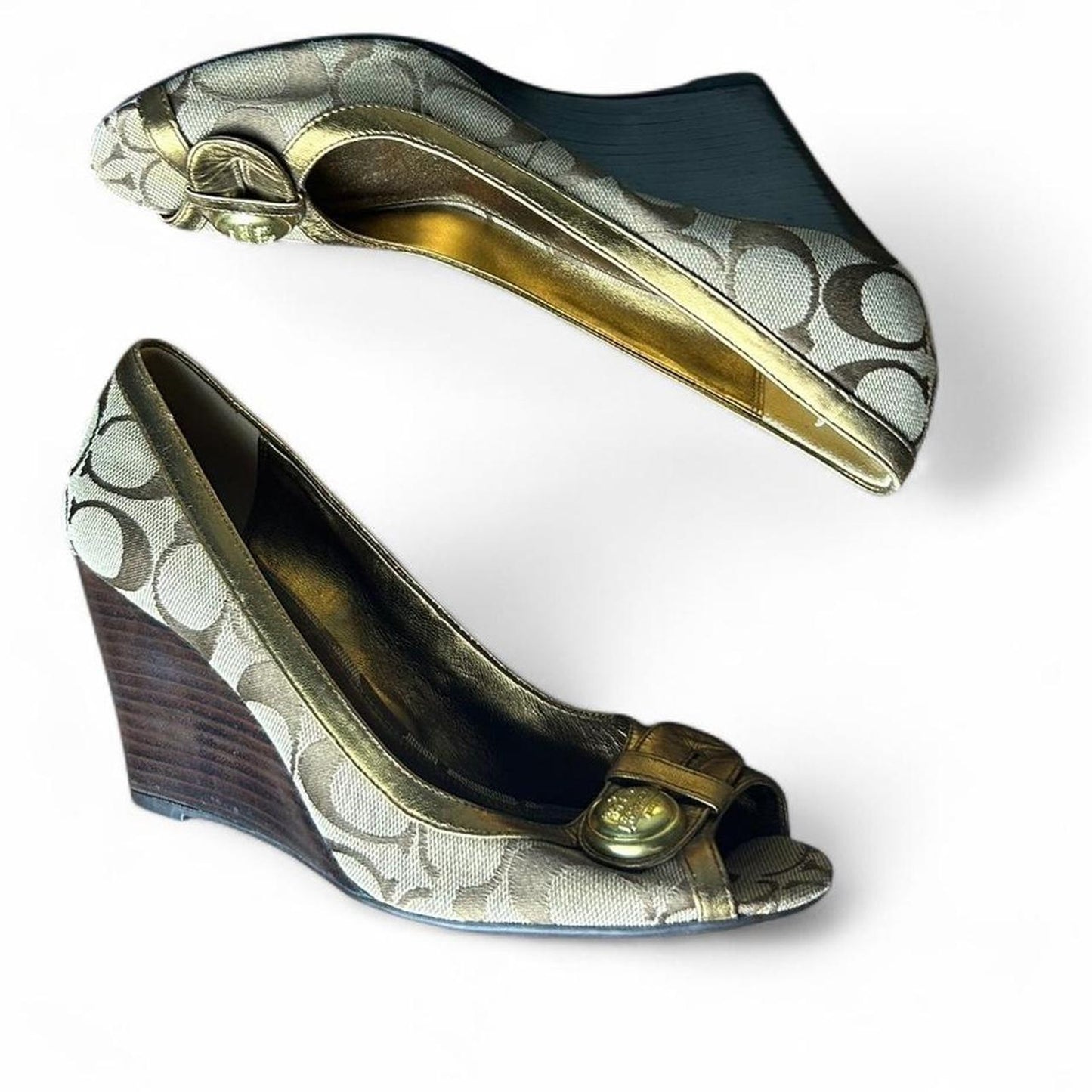Gold coach monogram wedge heels