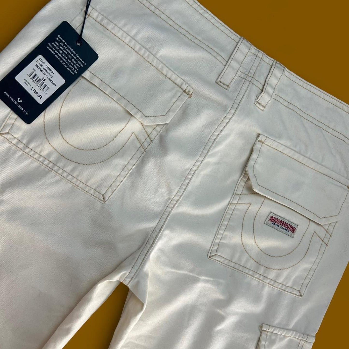 Pantalon cargo blanc avec étiquette