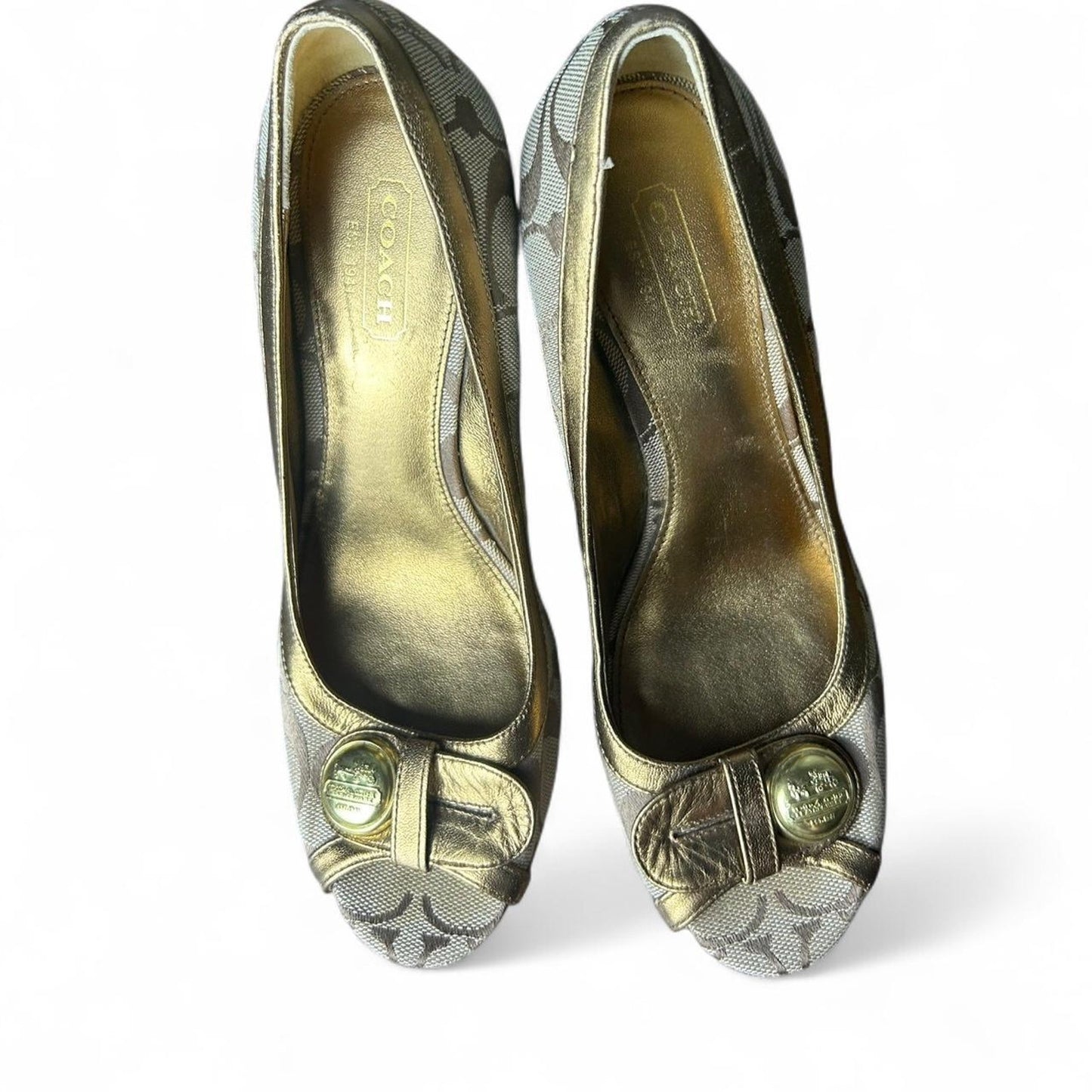 Gold coach monogram wedge heels